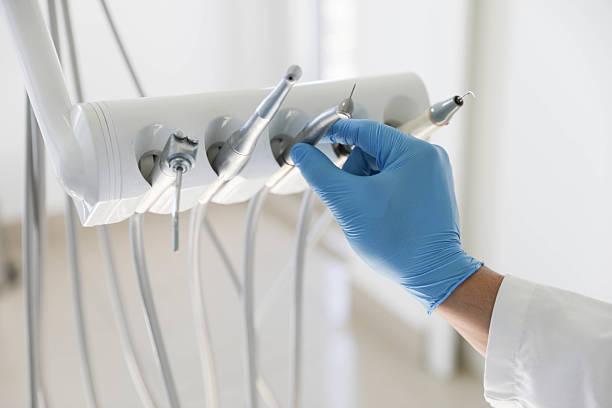 Professional Tooth Extraction technician working in Monroe, LA